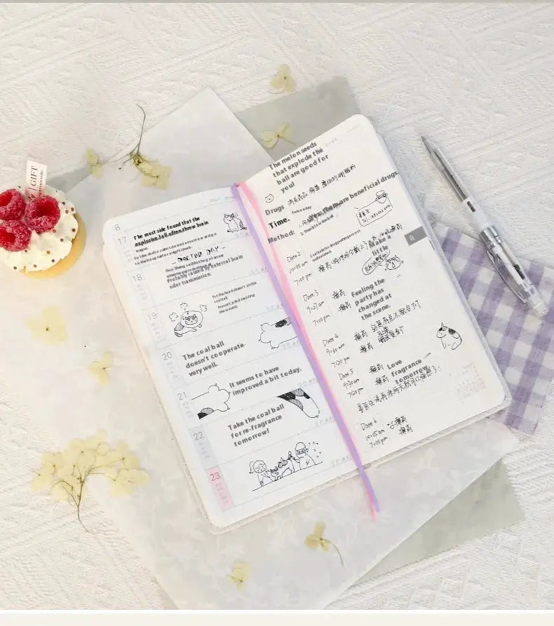 Kinbor 2026 weekly planner pocket-size notebook by Simples Market with pink bookmark, open to weekly schedule pages.