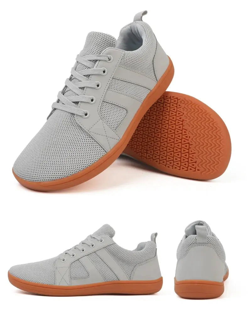 Wide-toed shoes by Simples Market, grey mesh upper with orange outsole