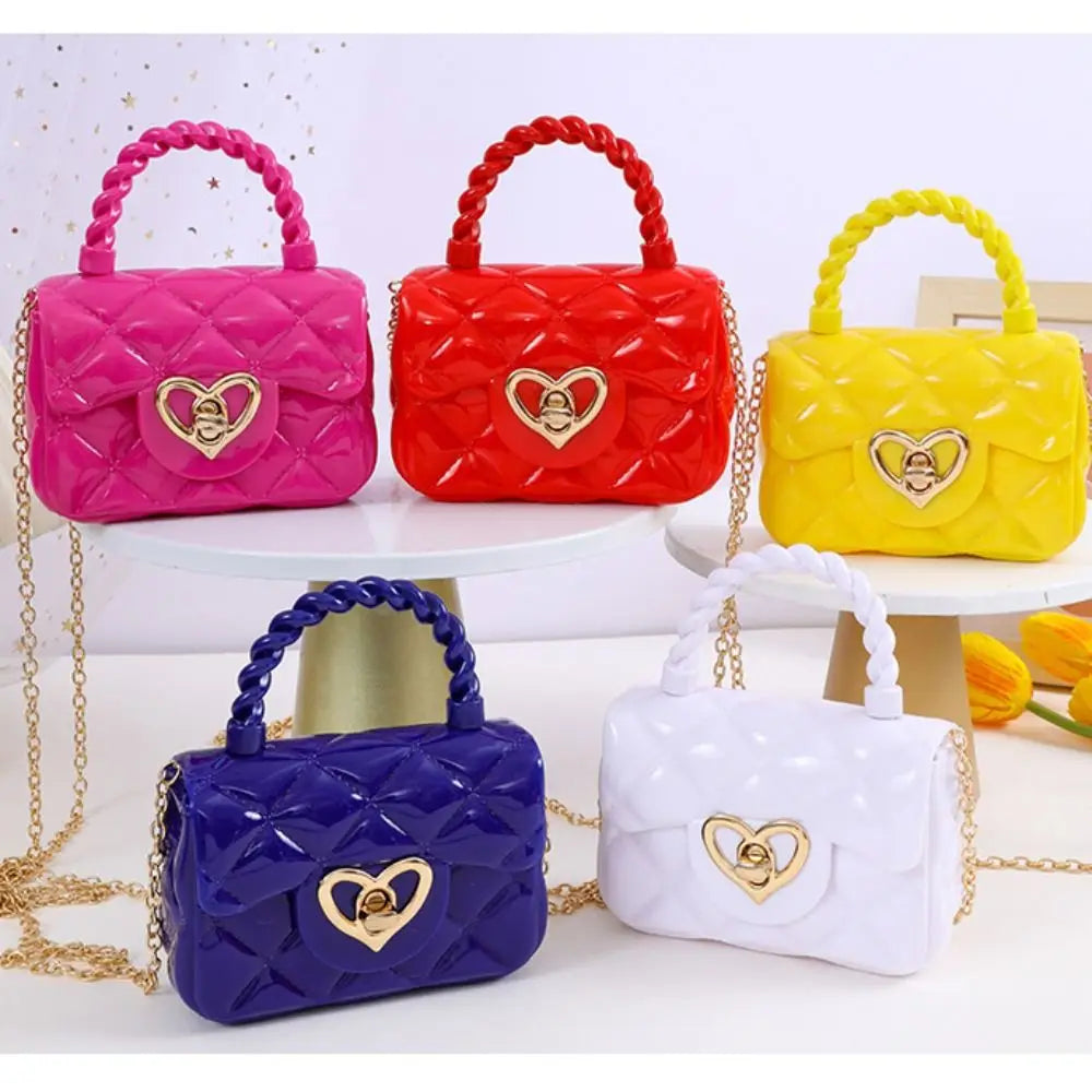 Kids PU leather crossbody bags set in pink, red, yellow, blue and white with braided handles and gold heart clasp