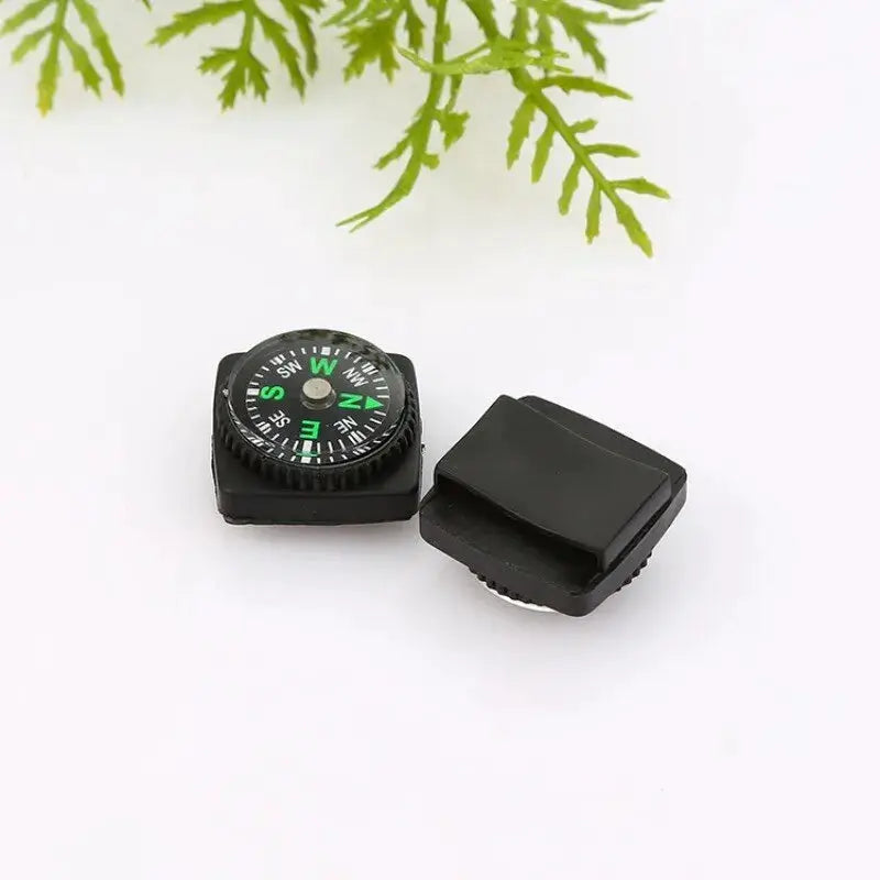 Small black outdoor compass with green dial; two-piece set with protective cap, Simples Market