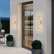 Outdoor waterproof wall lamps, natural stone strip, 18W LED, pair by Simples Market on white exterior wall
