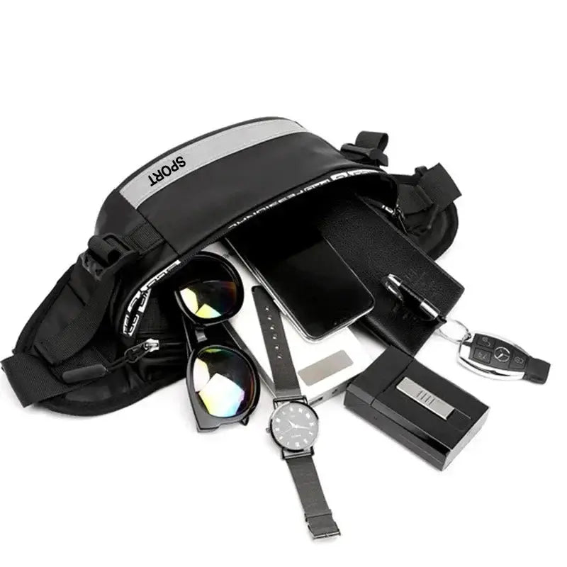 Black nylon waist bag with gray panel; large-capacity anti-theft belt bag, shown with phone, sunglasses, watch and keys.