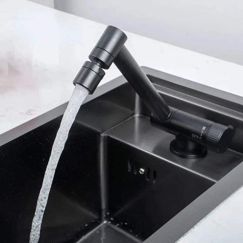 Black stainless steel kitchen sink with concealed single bowl and matte black faucet