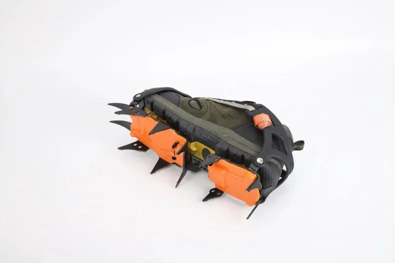 12-tooth ice crampons by Simples Market with orange mounting plates and stainless steel spikes