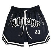 Simples Market black men's basketball shorts with white drawstring, zip pockets, mesh fabric, and a bold 23 graphic.