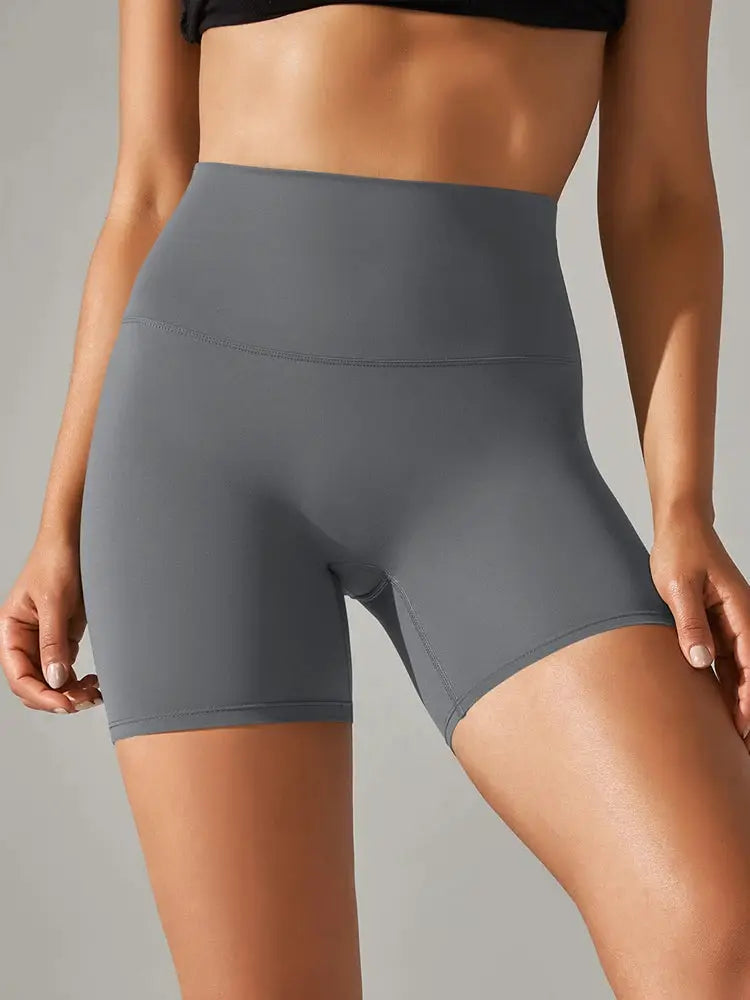 Women's gray high-waist yoga shorts by Simples Market; squat-proof, quick-dry fabric.