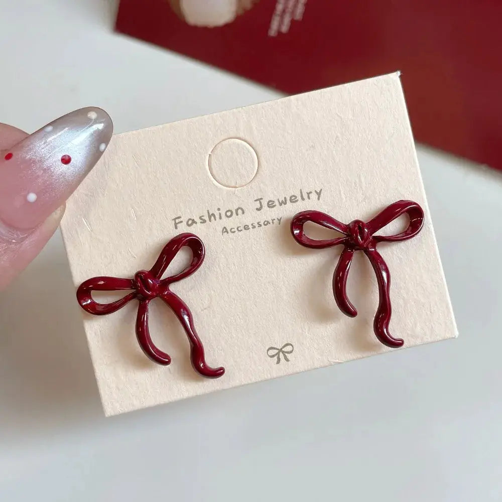 Bowknot stud earrings in red, pair for women with retro ballet ribbon style, fashion jewelry accessory