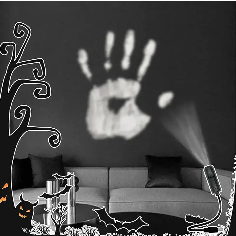 Halloween USB projector light projecting a white handprint on wall; USB-powered, 360° rotating pattern, dark ambiance