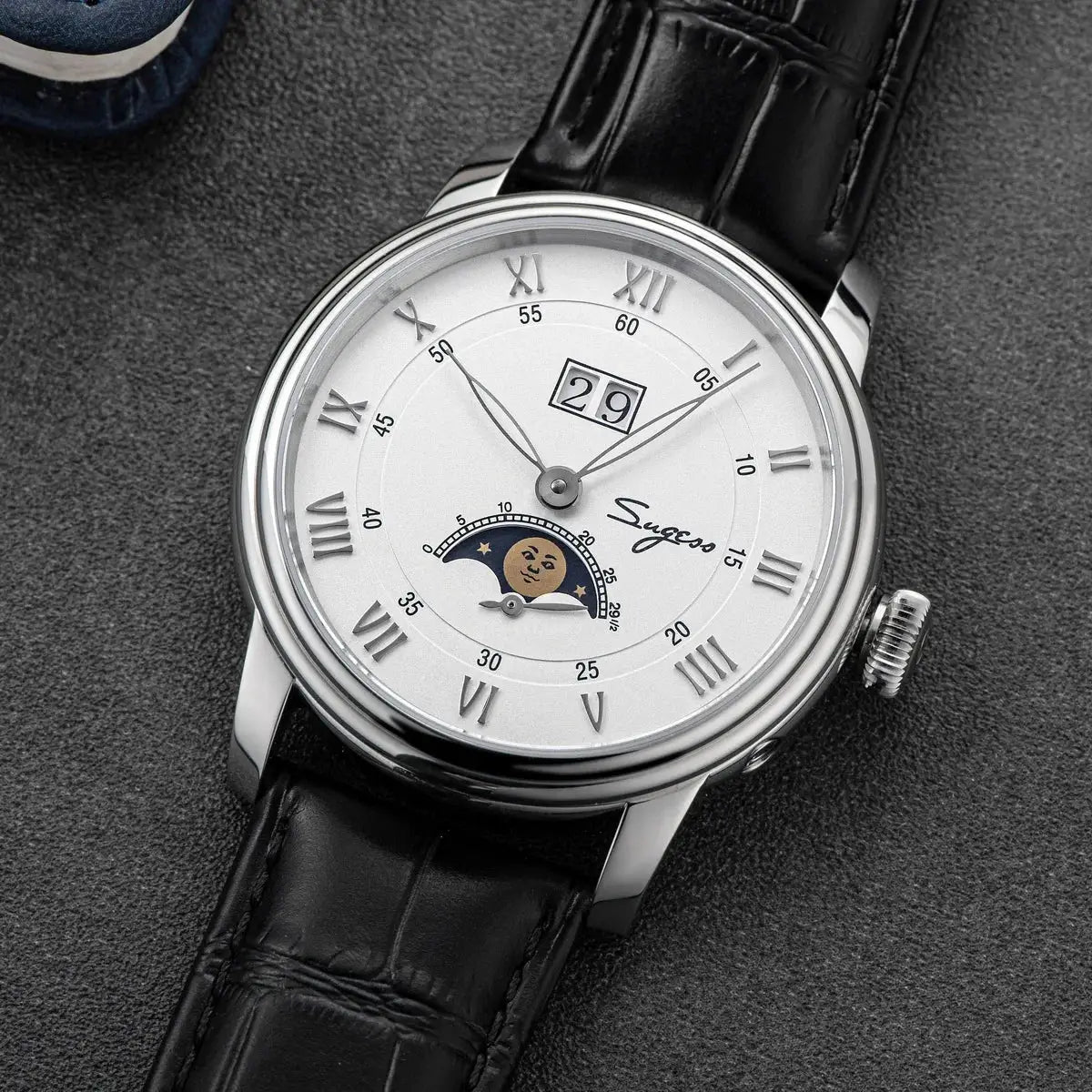Sugess Moonphase watch with stainless steel case, white dial, moonphase subdial, date window, leather strap.
