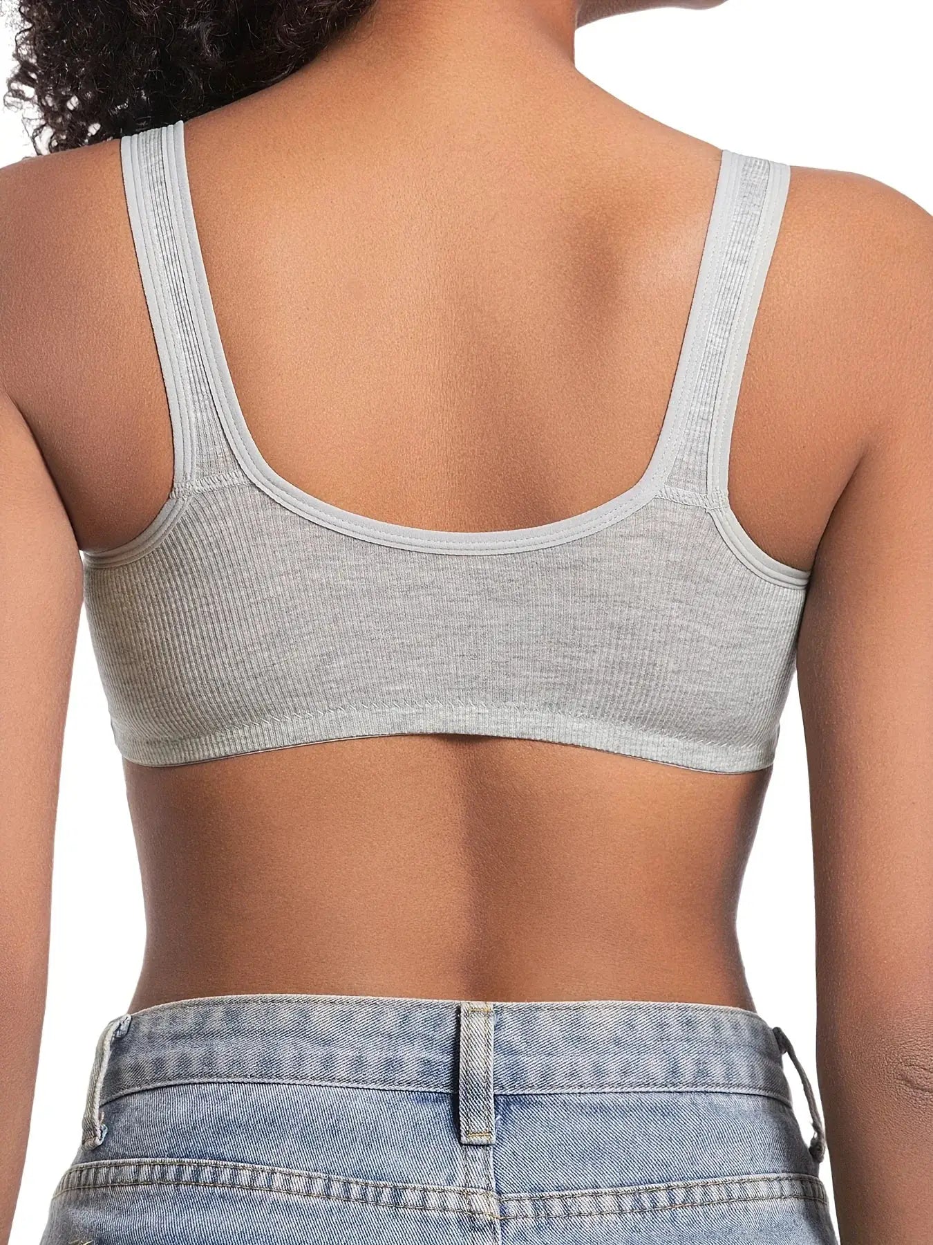Women's bra by Simples Market, wire-free full-coverage, light gray ribbed fabric, back view.