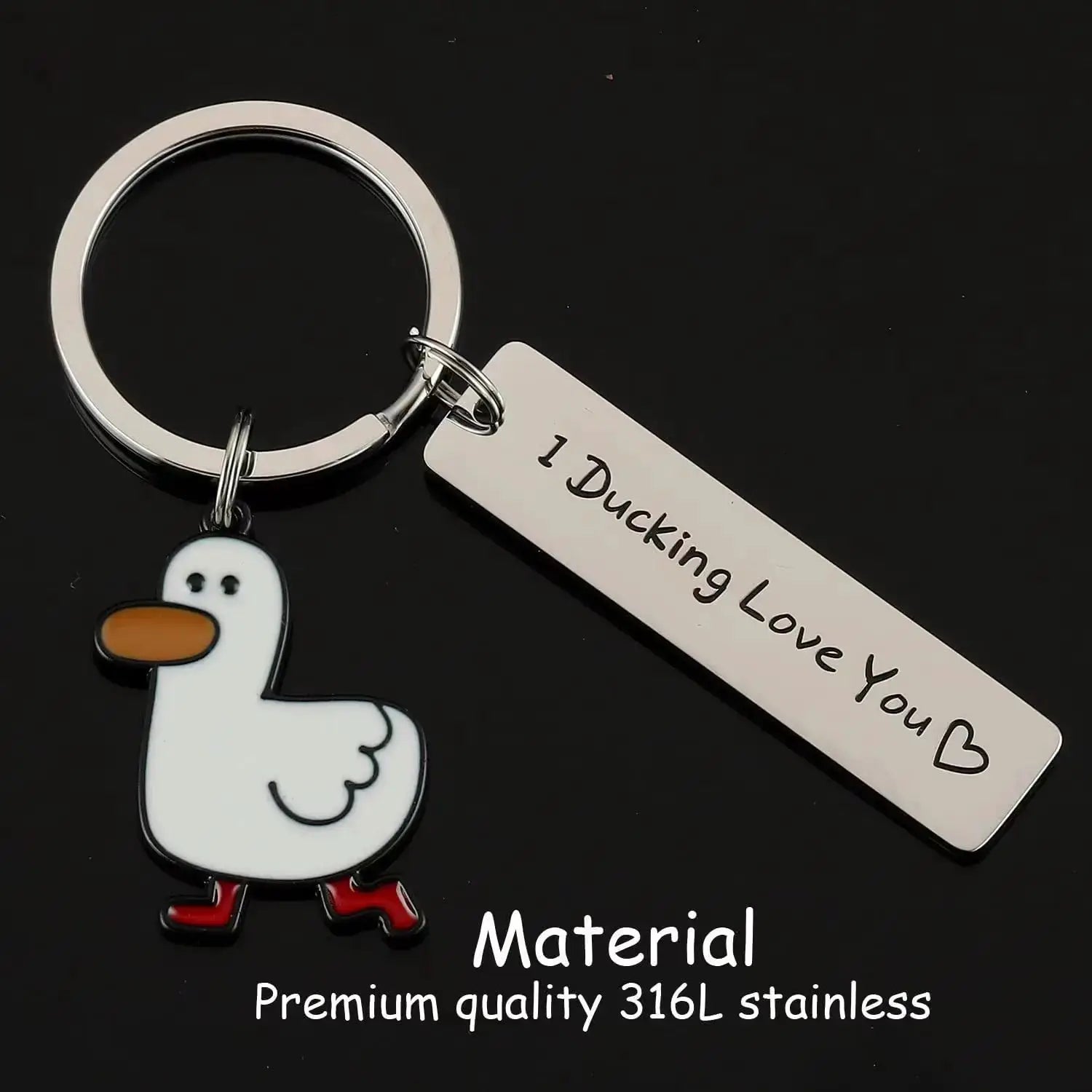 Funny duck keychain with white enamel duck charm, orange beak, red feet, and a tag reading I Ducking Love You on a silver ring