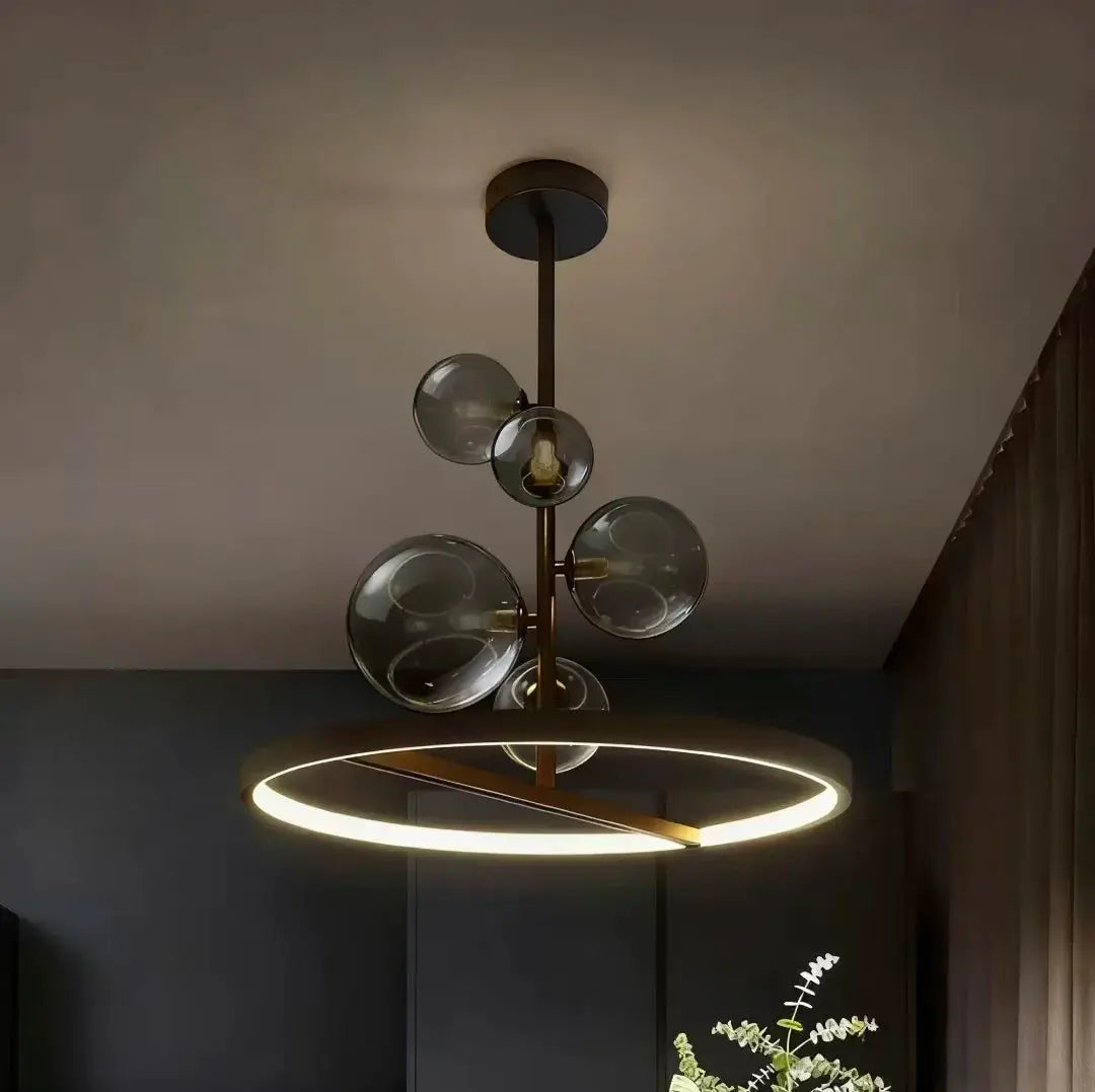 Modern Art Glass Chandelier by Simples Market; brass ring with frosted glass globes, warm LED.