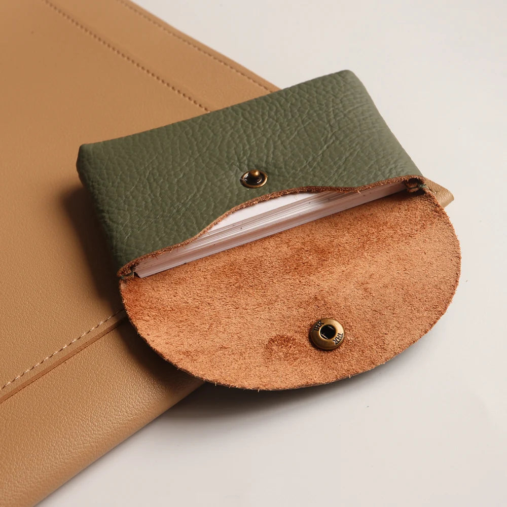 Leather card holder and coin purse by Simples Market, green exterior with tan suede interior.