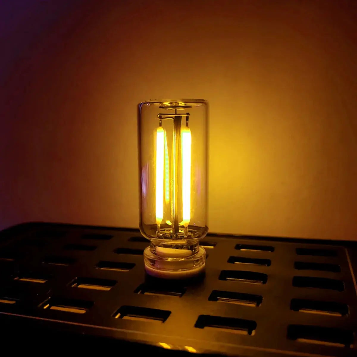 Simples Market portable USB touch night light with warm amber LED filament in a glass bulb