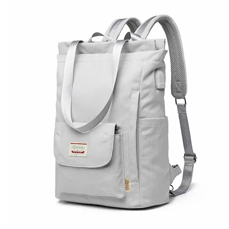 Women's waterproof laptop backpack by Simples Market, gray Oxford canvas with front pocket