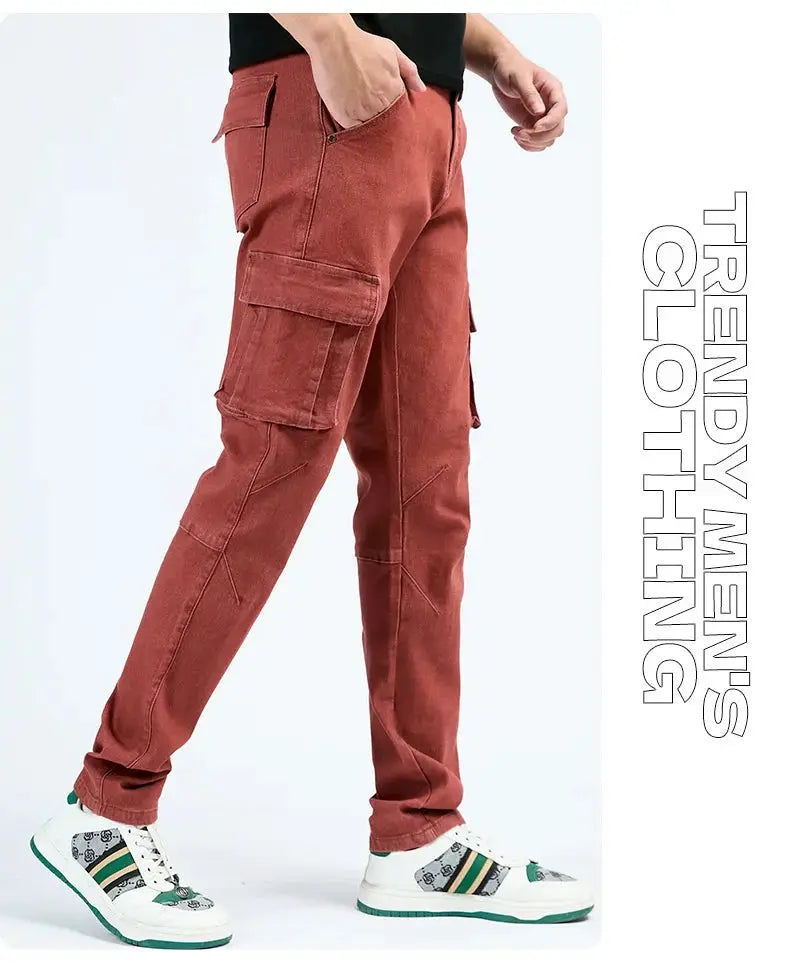 Men's denim cargo pants with elastic waist in washed brick red, multiple cargo pockets, slim fit