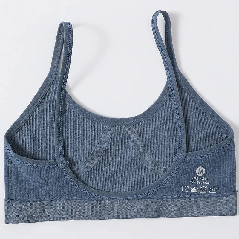 Seamless ribbed blue bralette for women with wireless cups, U-back, no pads, nylon/spandex.