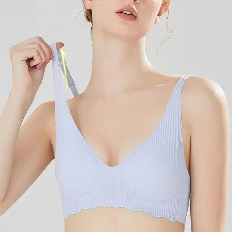 Seamless women's bra by Simples Market, light blue striped ribbed with V-neck and scalloped hem, adjustable straps.