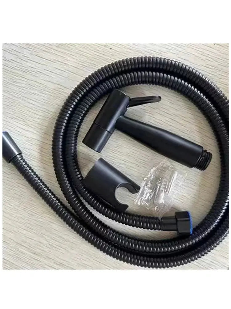 Black handheld toilet bidet spray set with flexible hose and wall mount