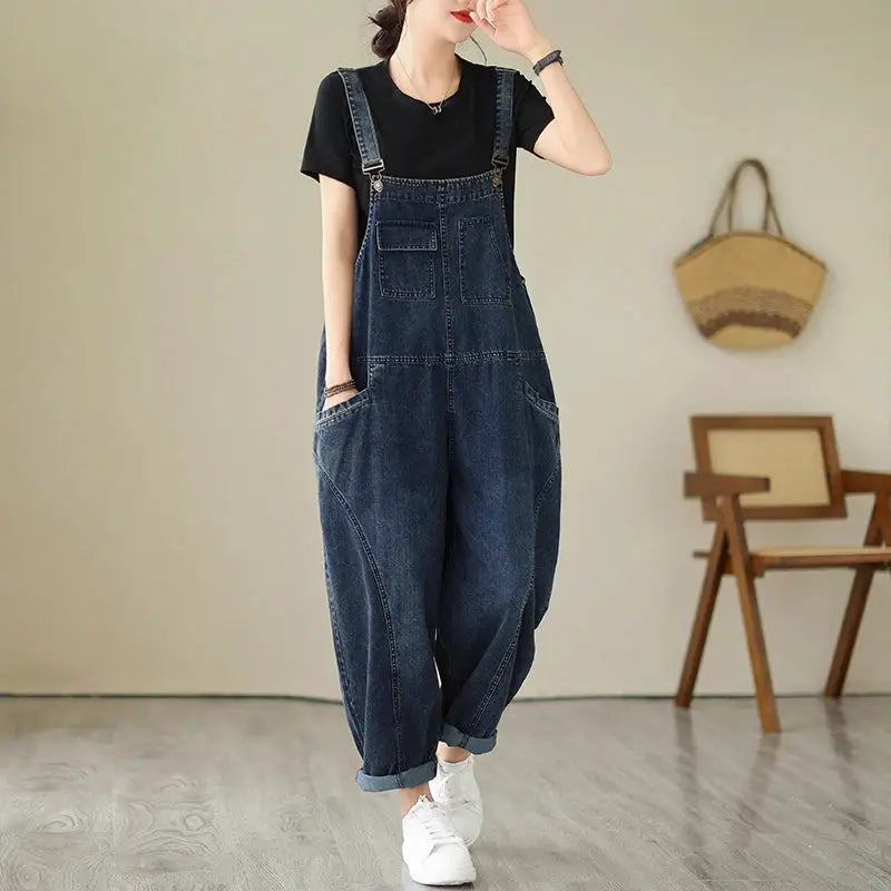 Women's blue denim cargo overalls with suspenders, loose-fit jumpsuit by Simples Market