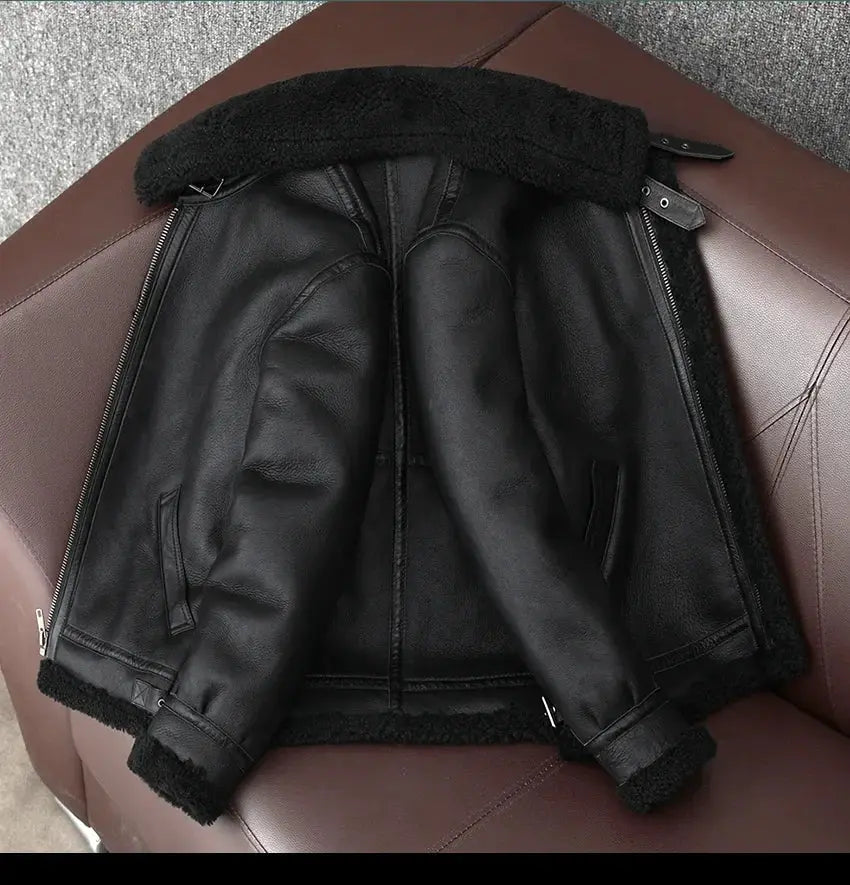 Leather shearling bomber jacket for men; black leather with plush fur lining.