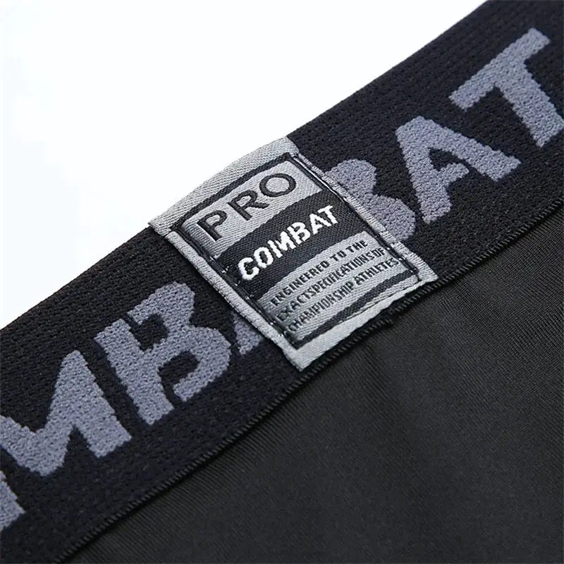 Men's 2-in-1 compression sport pants with black waistband and PRO COMBAT patch