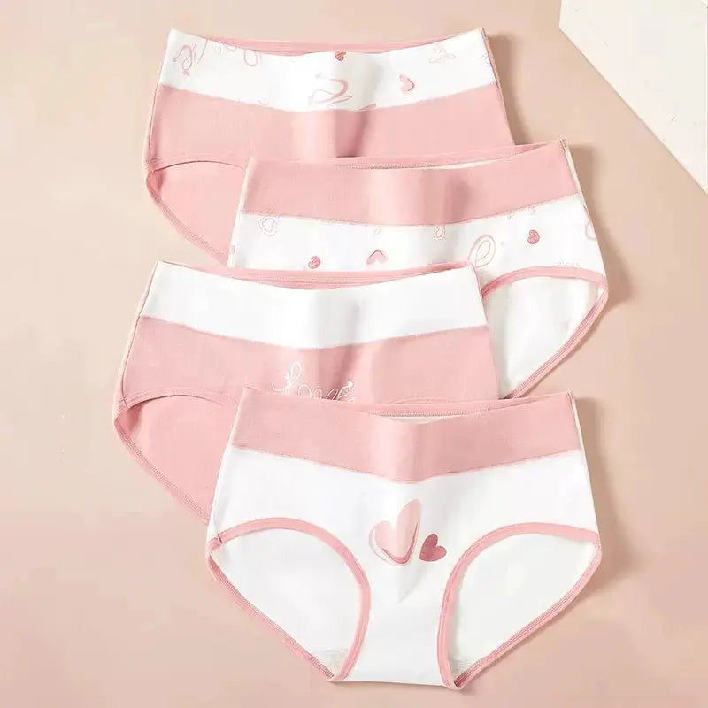 Simples Market 4-pack breathable cotton women’s panties in pink and white with heart prints.