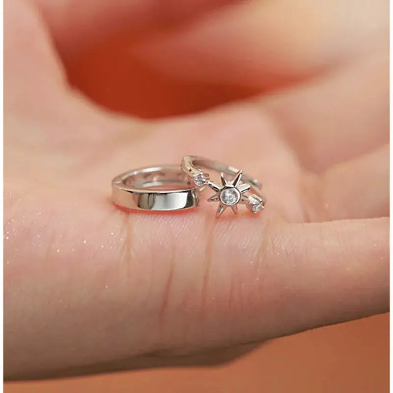 Sterling silver zircon star asymmetry hoop earrings pair; one plain hoop and one starburst charm
