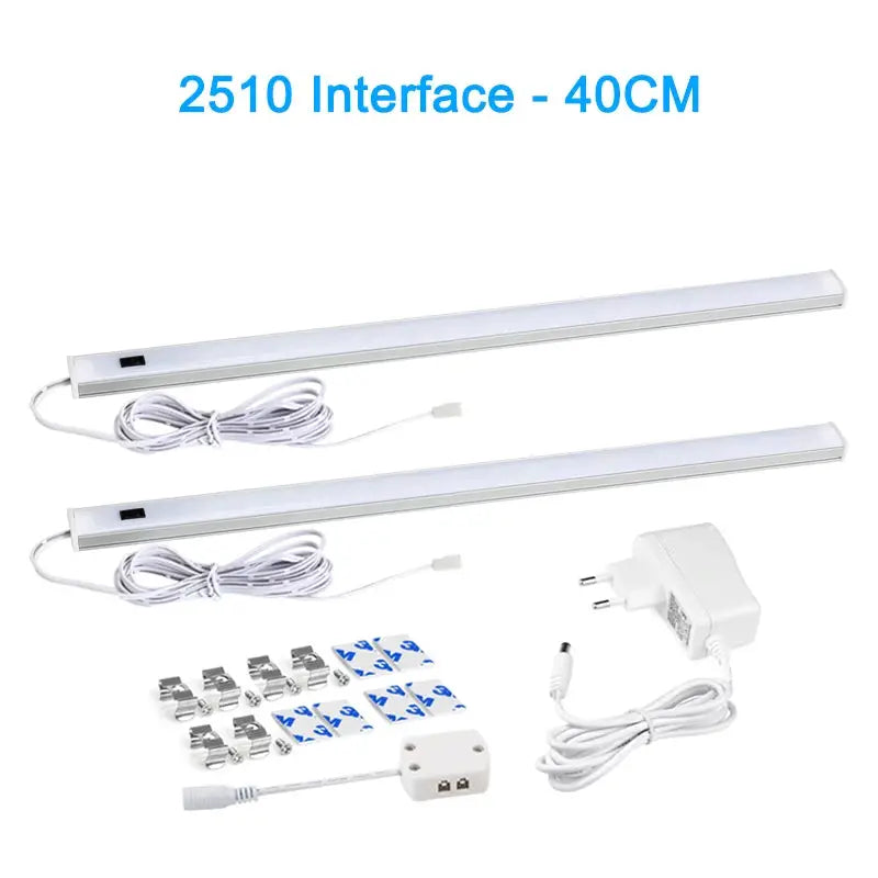 LED under-cabinet light kit with two 40cm strips, power adapters, mounting clips and adhesive pads
