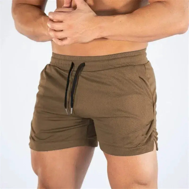 Men's olive gym shorts with black drawstring, lightweight running shorts.