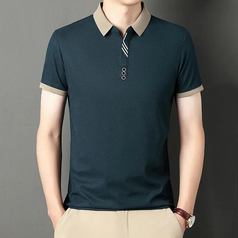 Men's navy polo shirt with beige collar and cuffs, short sleeves.