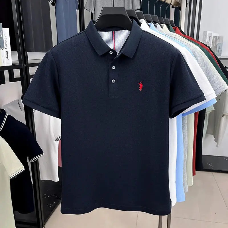 Men's navy polo shirt, 100% cotton, with red pony embroidery.