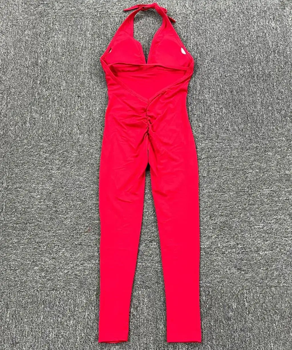 Red yoga jumpsuit with halter neckline and padded bust