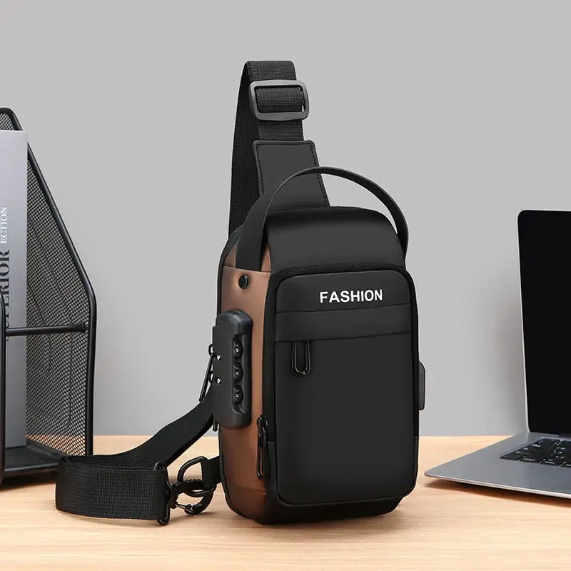 Men's anti-theft chest bag crossbody with black/brown panels, front pocket labeled FASHION, adjustable strap