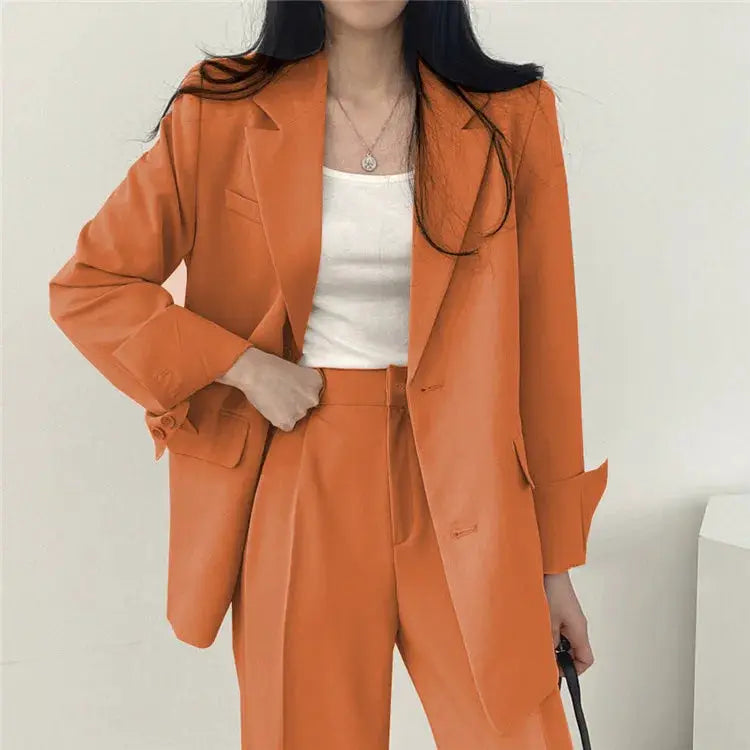 Orange women's 2-piece blazer and pants set from Simples Market with long sleeves, fall fashion