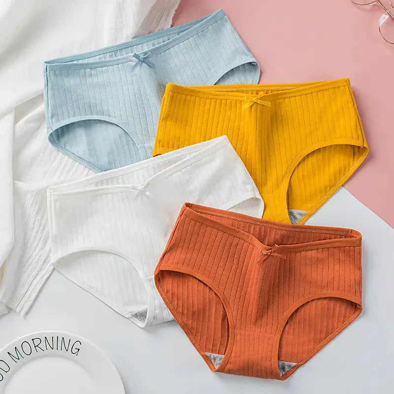4-pack women’s cotton ribbed mid-rise briefs with bow detail in assorted colors: blue, white, yellow, rust