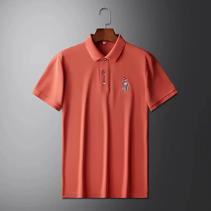 Men's polo shirt by Simples Market, coral short-sleeve with embroidered chest logo.