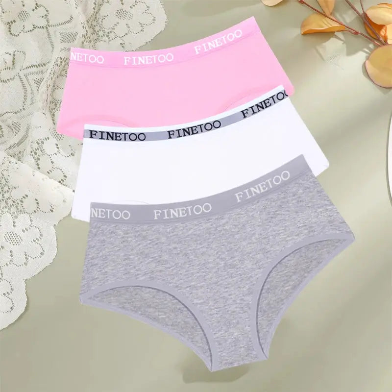 Three-pack FINETOO cotton women's low-rise briefs in pink, white, and gray, breathable stretch underwear