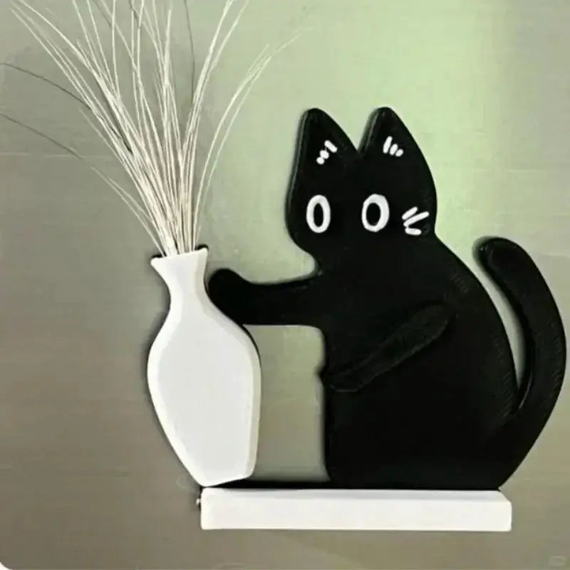 Refrigerator magnet featuring a black cat pushing a white vase from the Whisker Collection decor