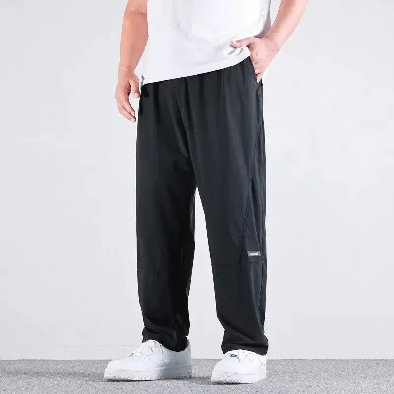 10XL men's black casual pants by Simples Market with elastic waist and loose straight fit.
