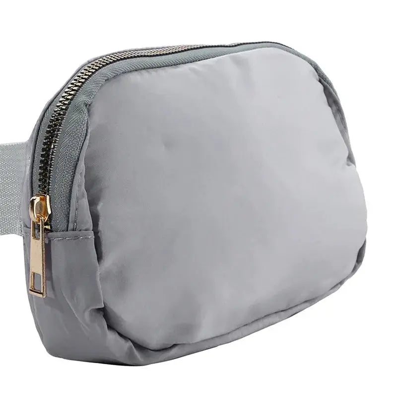 Simples Market gray waist bag with gold zipper, compact fanny pack for travel and outdoors