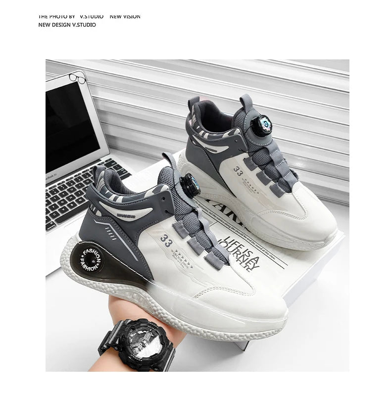 Pair of men's sneakers with rotating buckle, white and gray, non-slip sole.