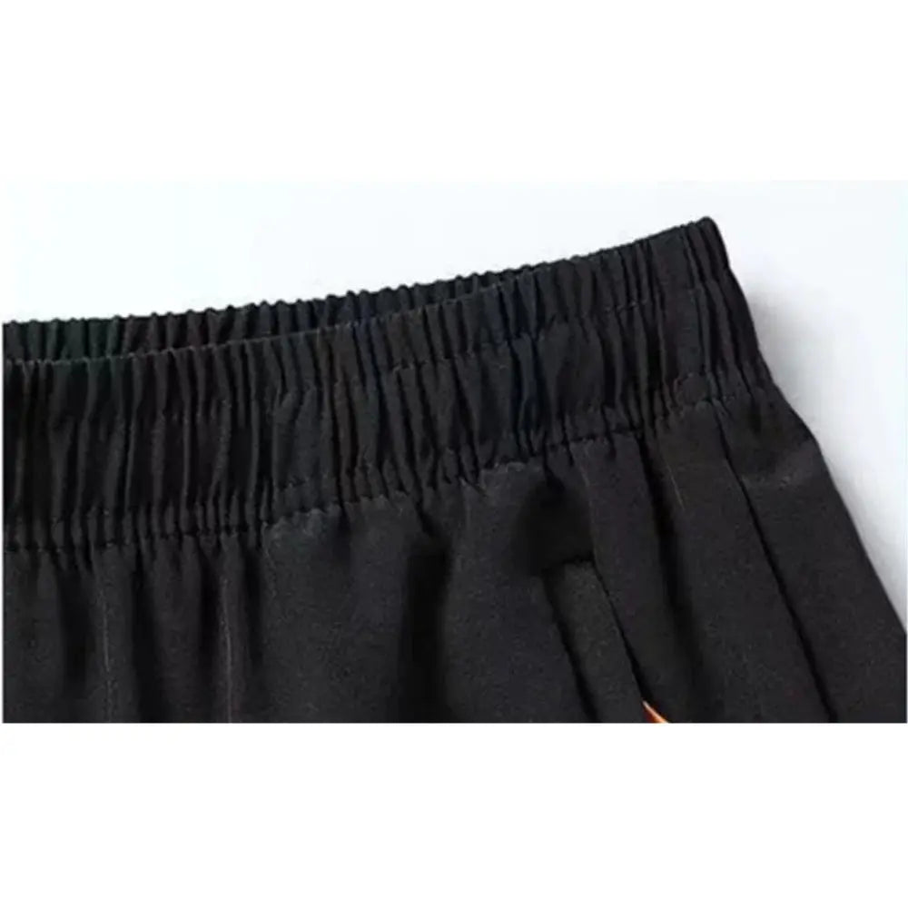 Men's black elastic-waist shorts with zip pocket for gym and beach, quick-dry