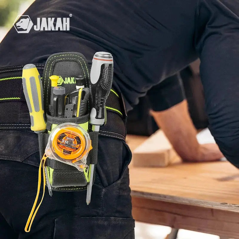 JAKAH small tool holder pouch on a black waist belt with lime-green trim, holding screwdrivers, tape measure and knife