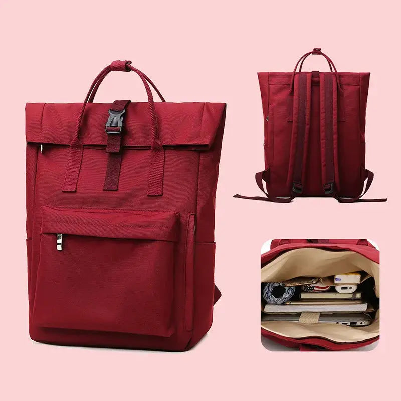 Red large-capacity school backpack with front zip pocket, top handle, and adjustable straps