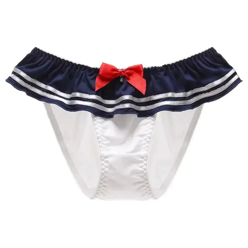 Milk-silk sailor-style panties with navy frilled waistband, white panel and red bow.