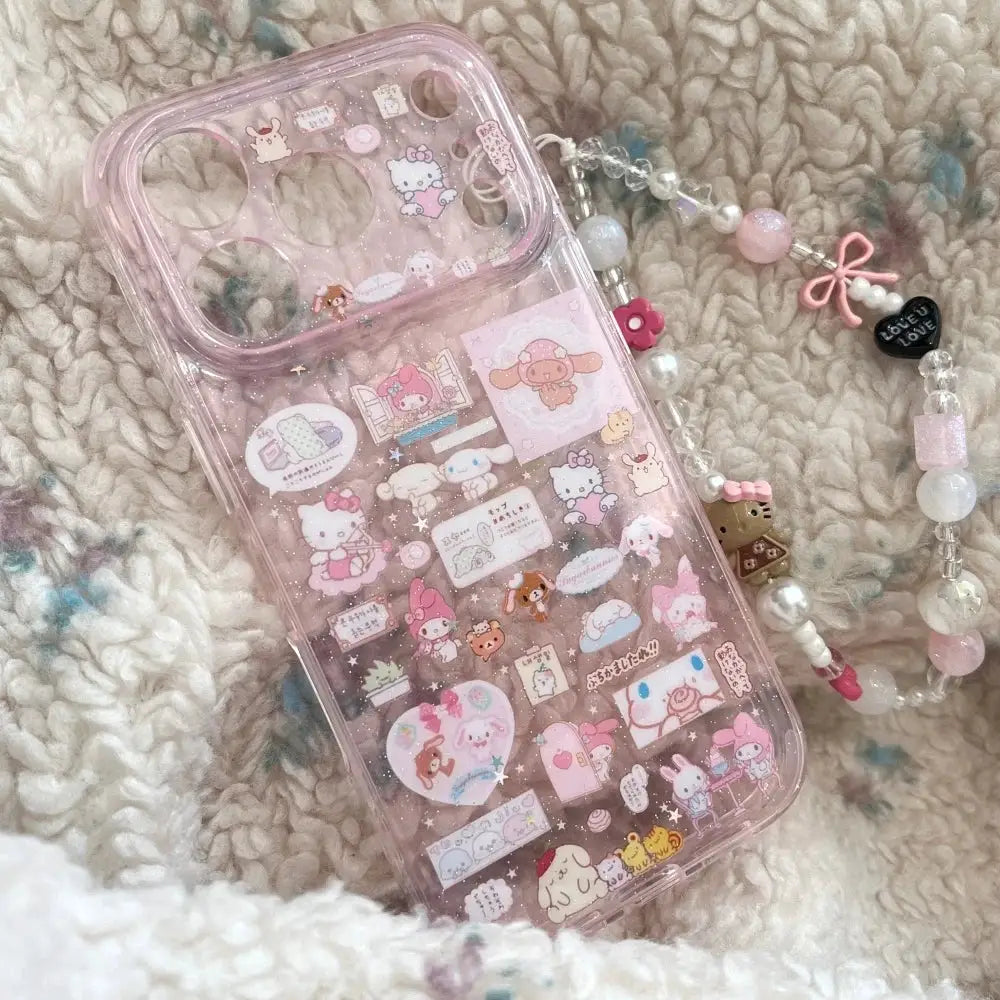 Hello Kitty Melody pink translucent iPhone case with pendant bracelet, sticker-filled back.