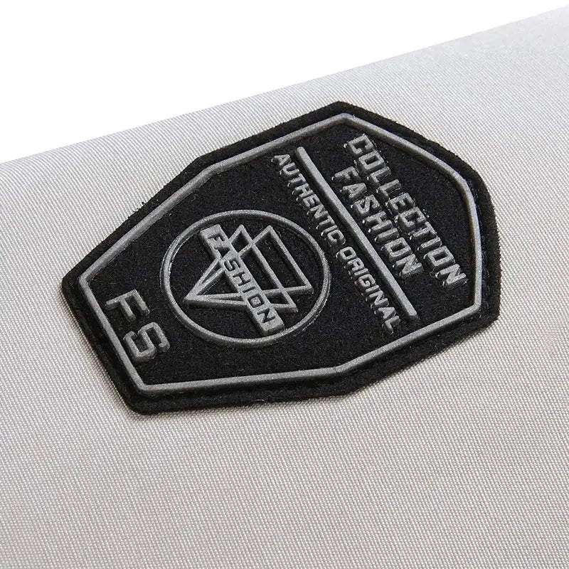 Men's thick puffer jacket in light gray with a black FS logo patch