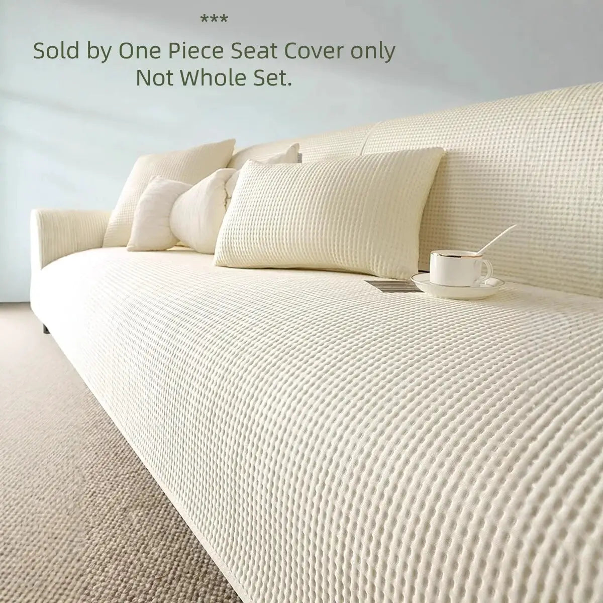Summer Cooling Touch anti-slip sofa cover in cream; textured quilted fabric for living room sofas.