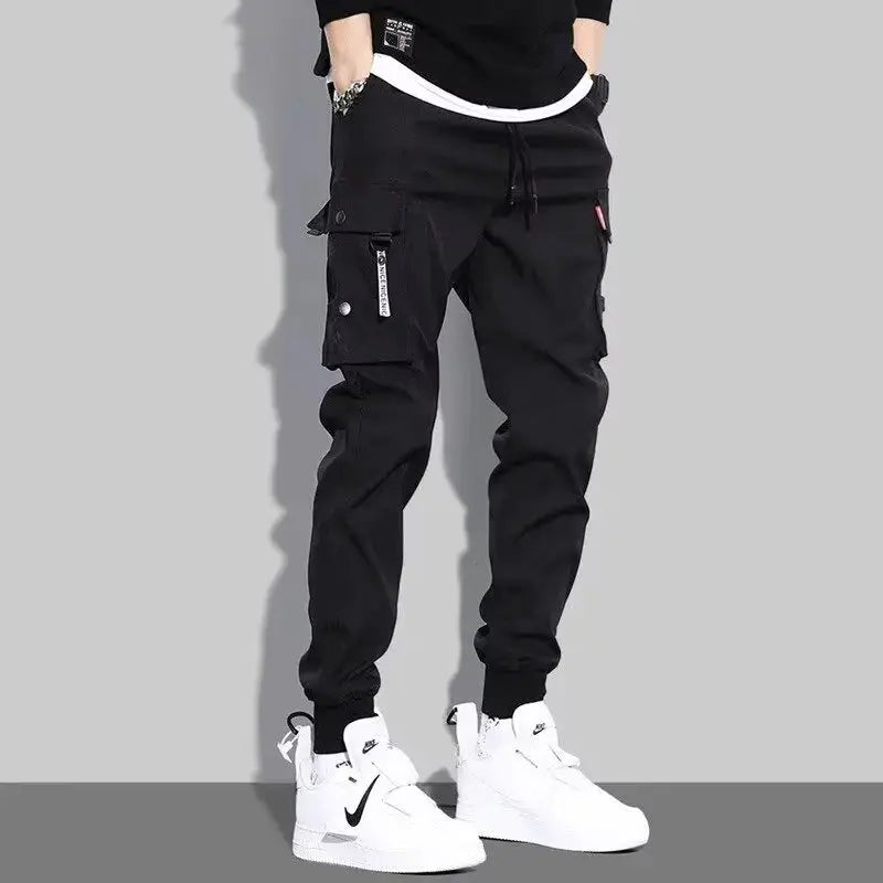 Men's tactical cargo pants by Simples Market, black with multiple pockets, jogger fit and drawstring waist